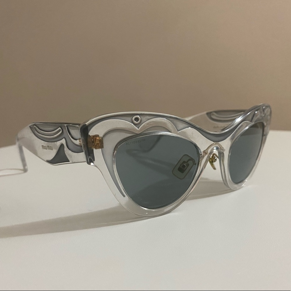 Grey Miu Miu sunnies